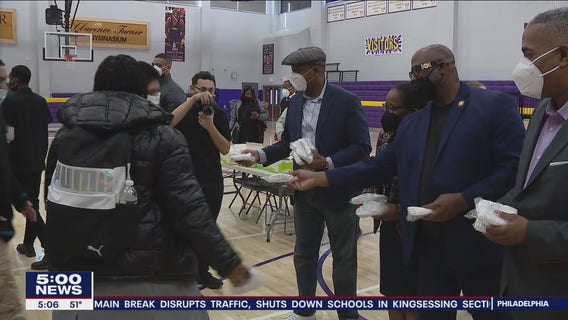 Camden officials distribute KN95 masks, as rollout of free masks nationwide begins