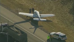 Small plane lands on interstate in suburban Chicago
