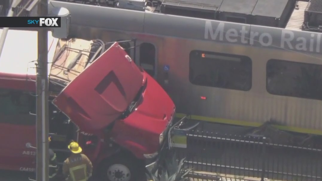 Dozens injured after bus collides with Metro train