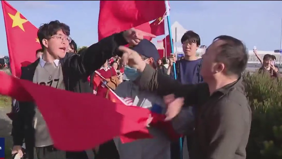 Protesters clash as China's leader Xi Jinping arrives at SFO for APEC