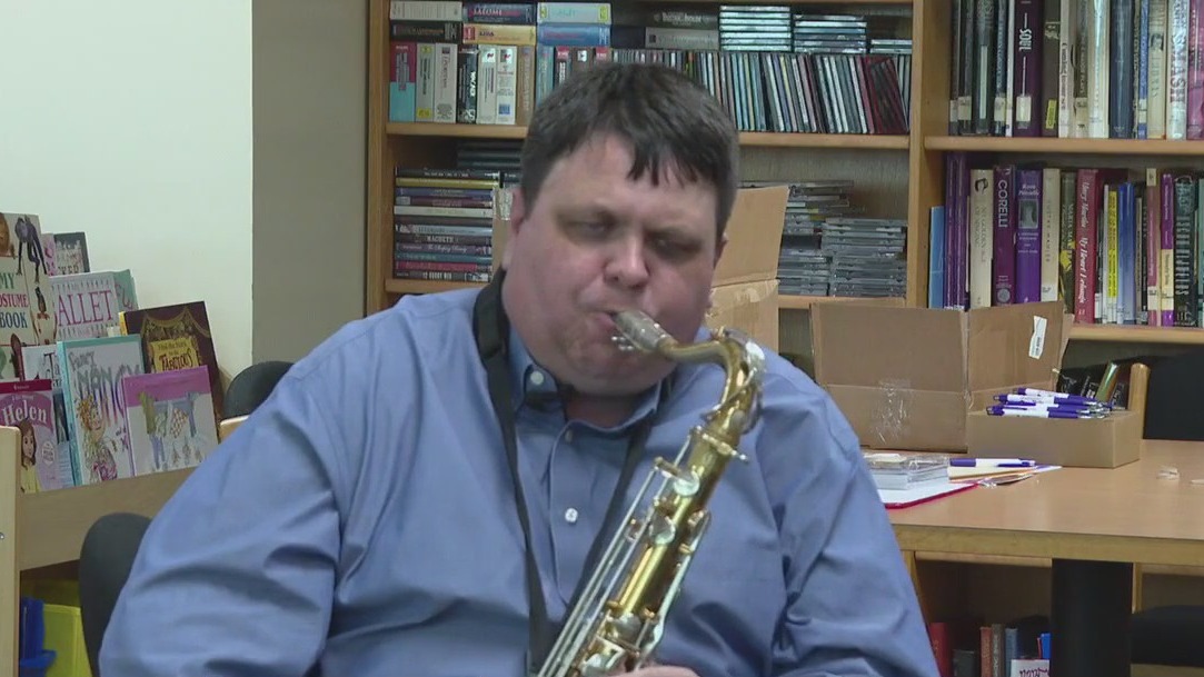 Blind saxophone teacher inspires students