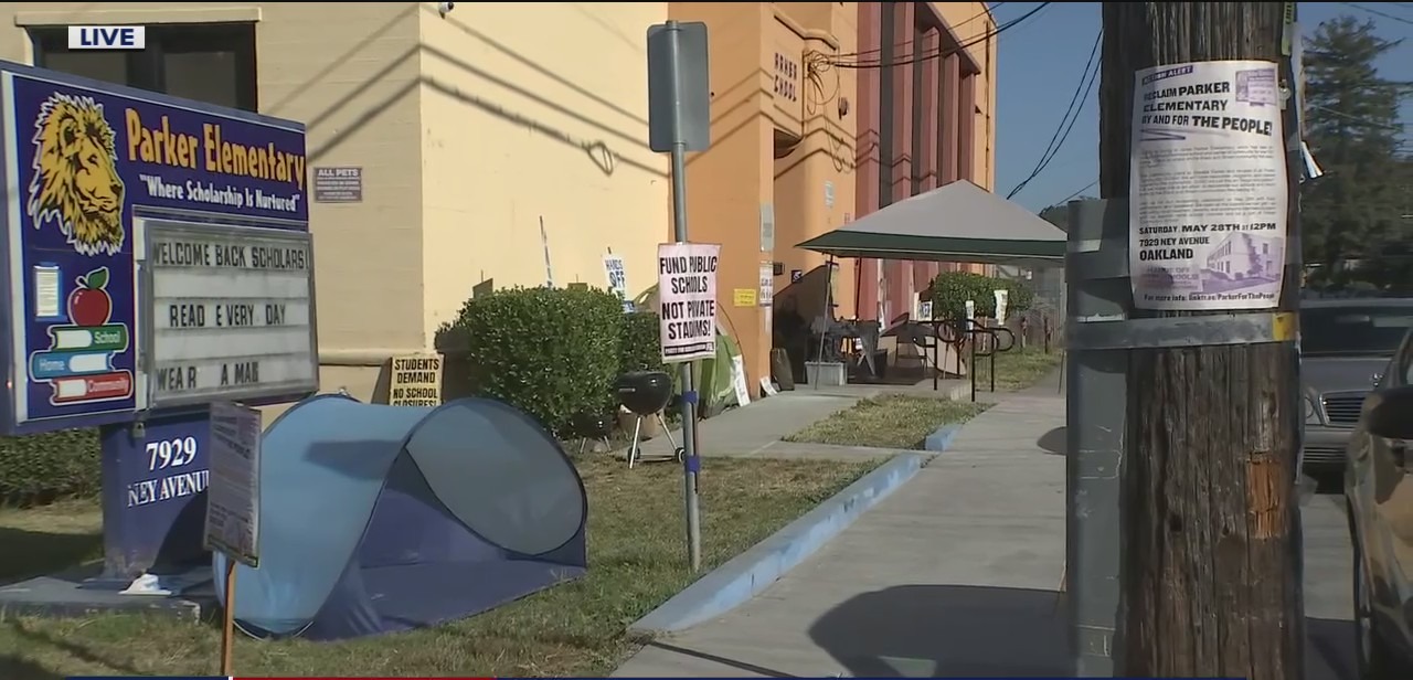 Protesters organize summer school for kids in a closed Oakland school