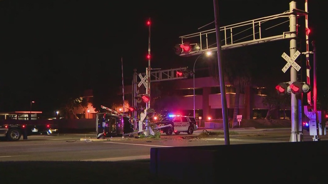 Driver detained following rollover crash in Tempe