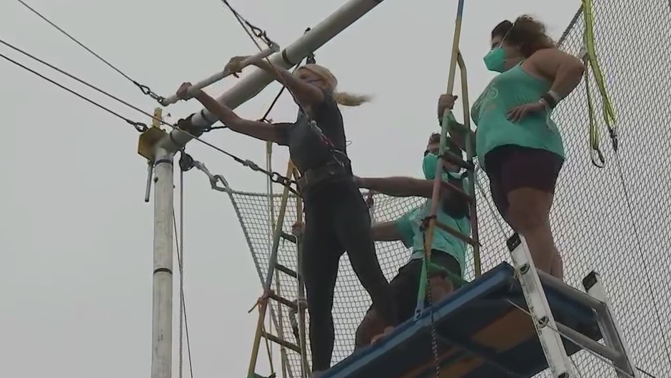 Trying out with the trapeze with Uprise Circus