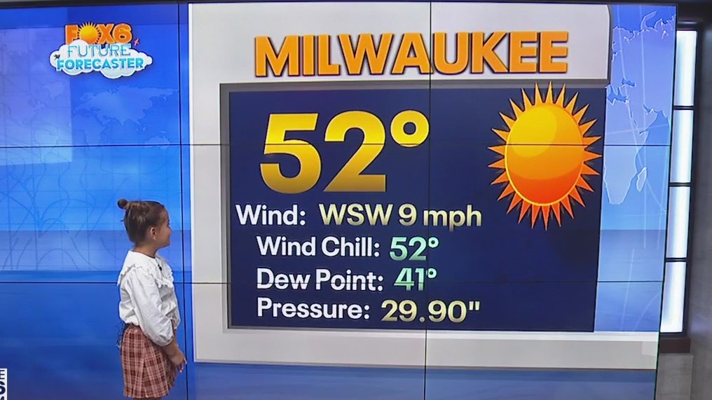 7-year-old Veda helps with the weather