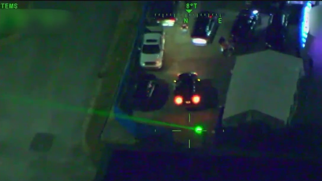 Man arrested after pointing laser at police helicopter