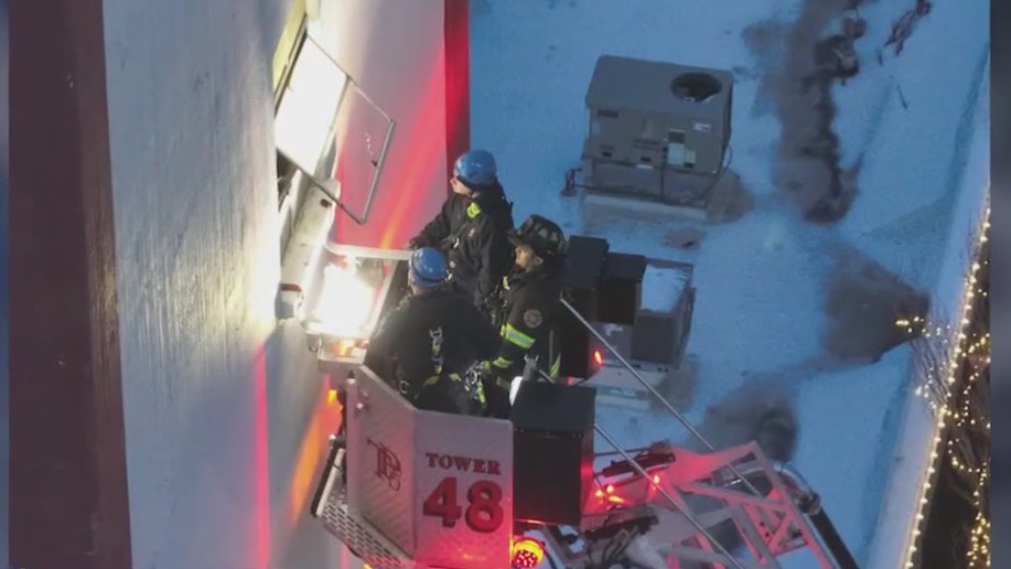 Frankfort rooftop rescue: Man hospitalized after being trapped on top of Grainery tower
