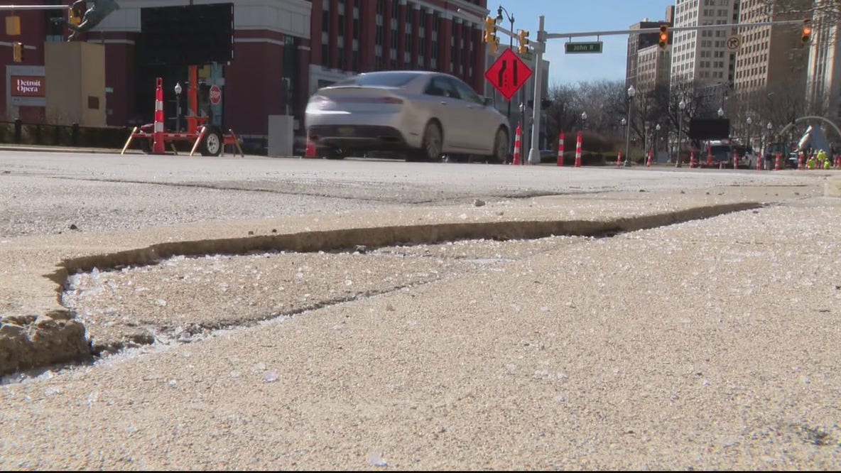 Detroit expanding sidewalk, road repair