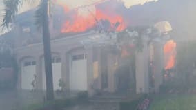 Coastal Fire: Roof collapses, loud bangs heard outside several burning OC mansions
