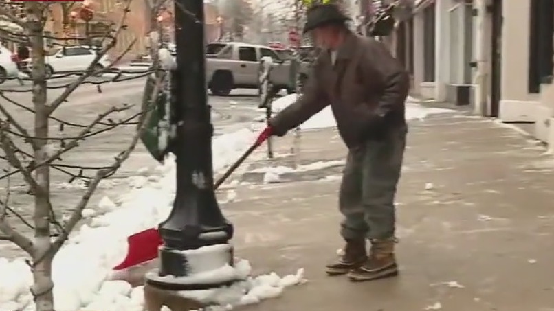 Downtown Hinsdale digs out after 'wet and heavy' snowfall