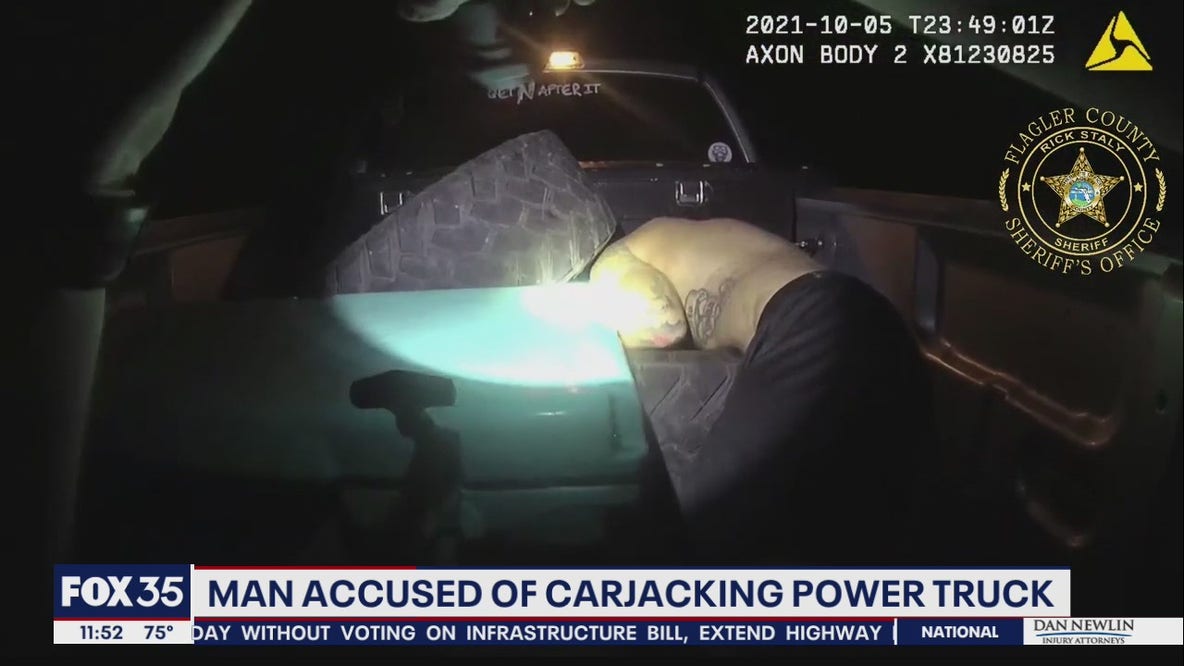 Body cam shows suspect sleeping in someone's truck before carjacking, deputies say