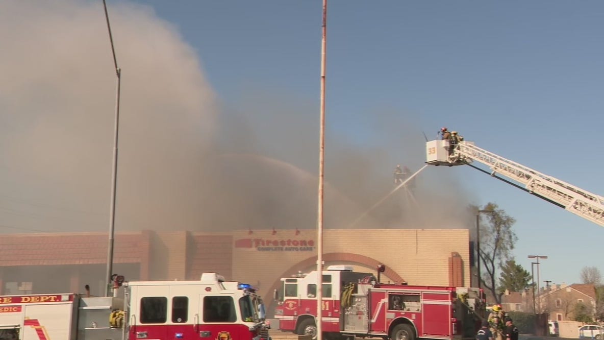 Firefighters battle fire at north Phoenix auto shop