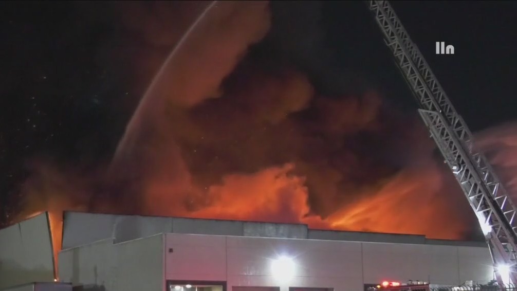 Crews knock down stubborn commercial building fire in Paramount