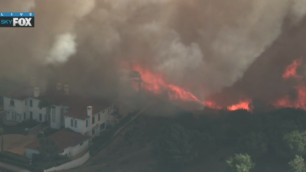 Massive fire spreads across Laguna Hills area