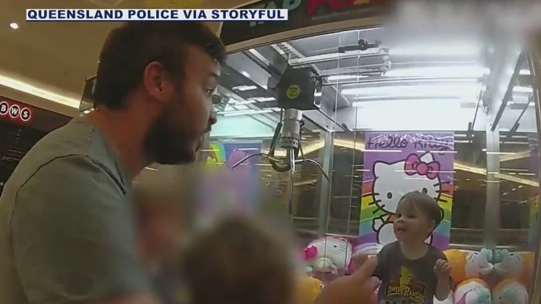 Toddler gets stuck in Hello Kitty claw machine