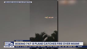 Boeing 747 with 'softball-sized hole' above engine catches fire, makes emergency landing in Miami