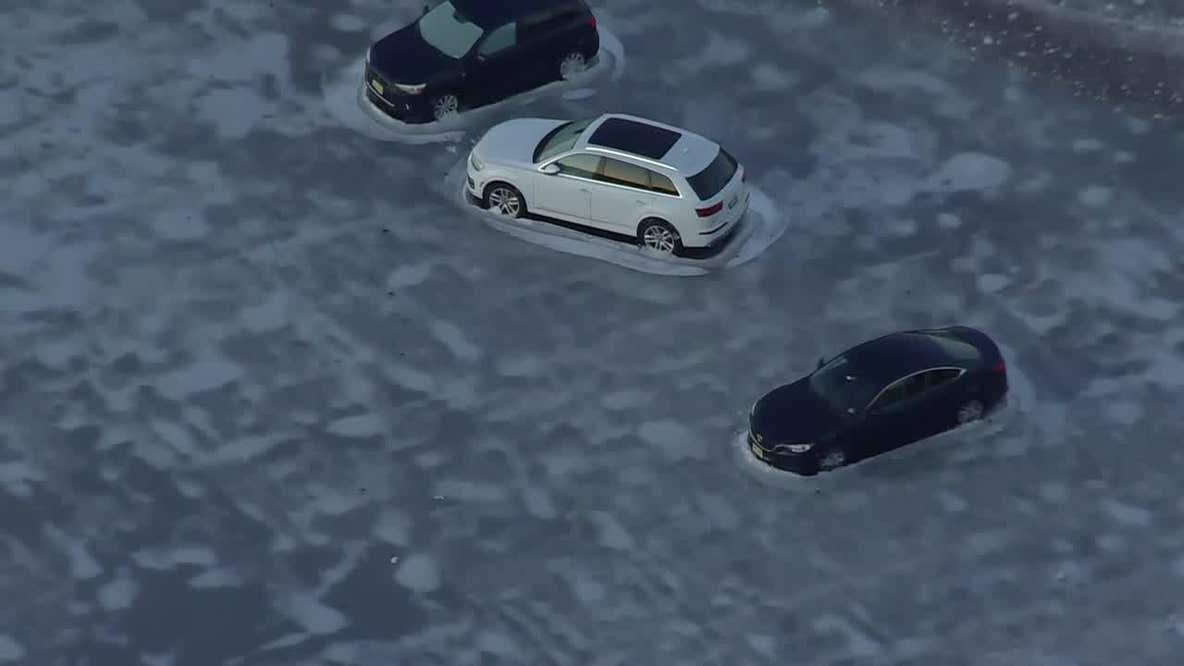 Cars stuck in ice in Edgewater, N.J.
