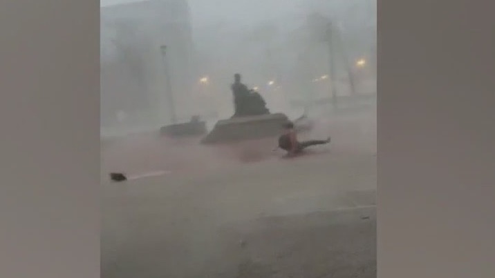 Wild video shows University of Kentucky student knocked off feet by severe storm's wind