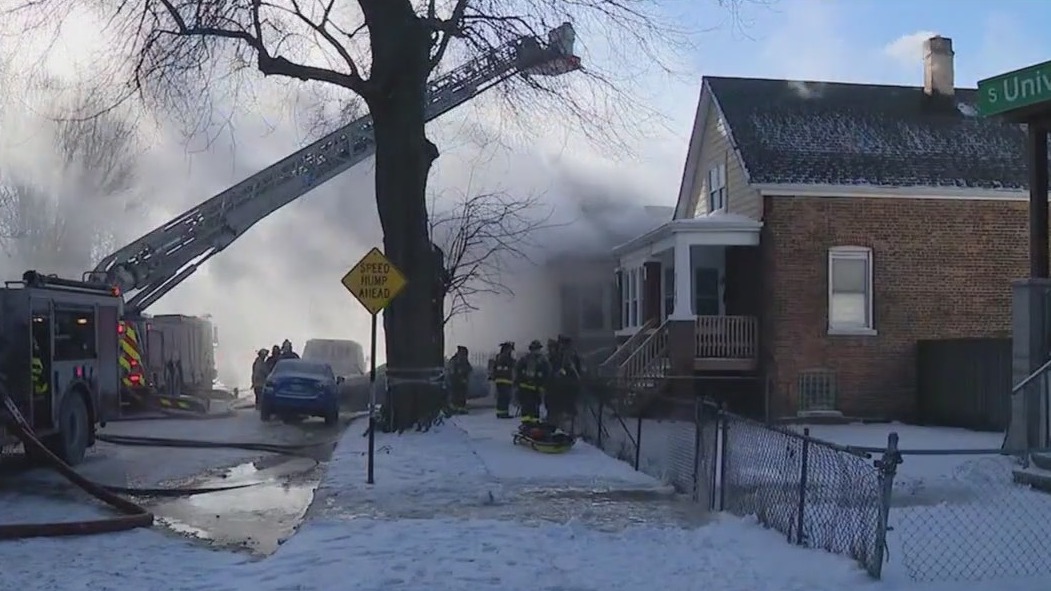 Chicago firefighters battle blaze at Grand Crossing home