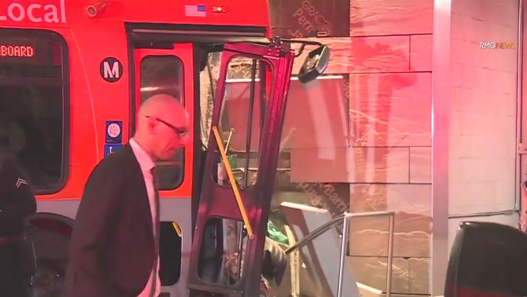Carjacked bus crashes into Ritz-Carlton