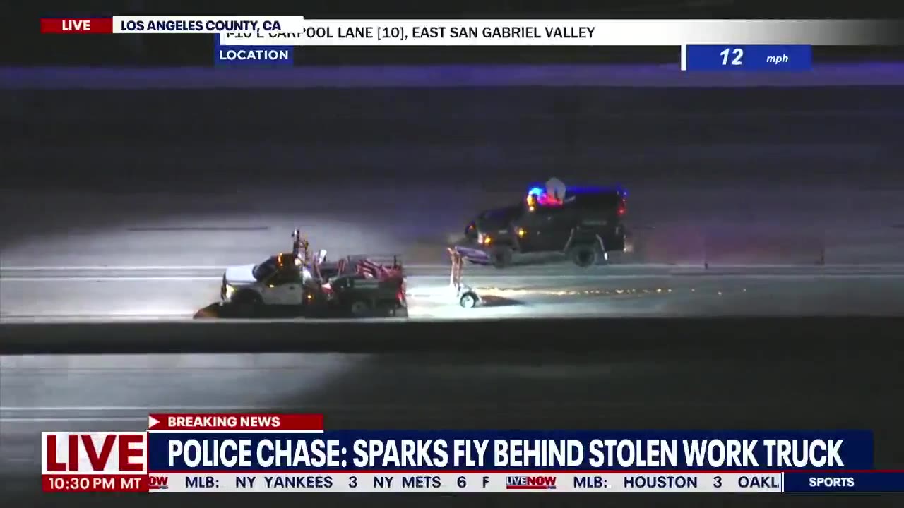 Police Chase: Spark flies behind stolen work truck