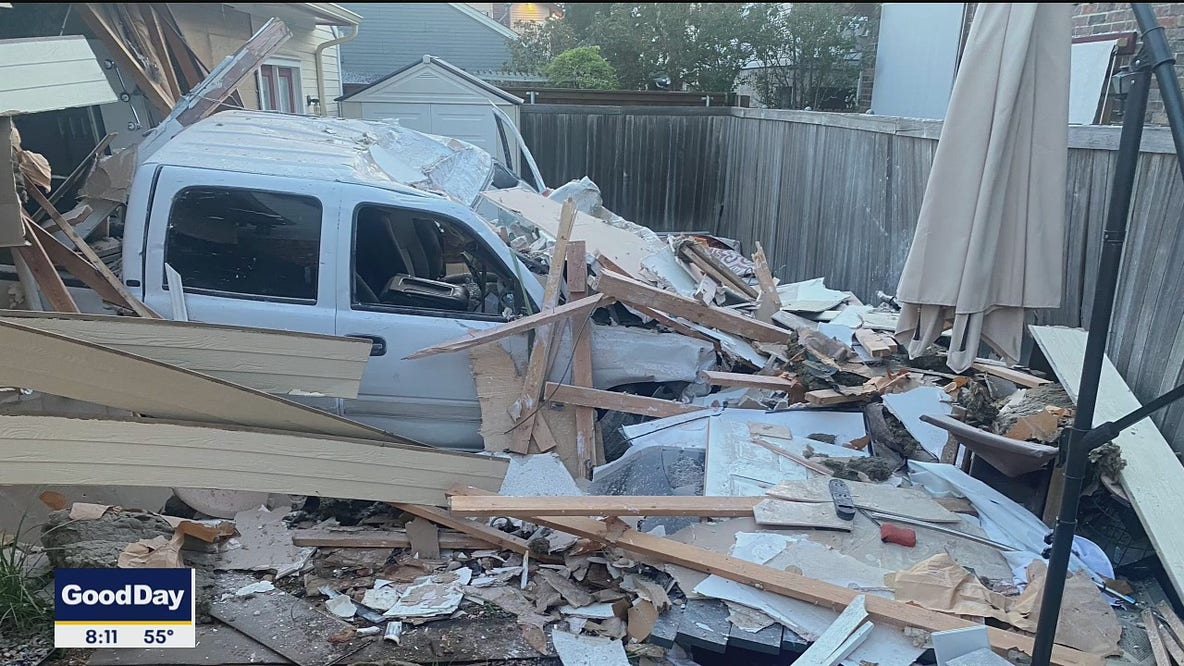 Pickup truck crashes through Dallas home