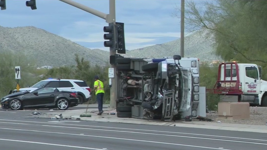 Ambulance rolls over following Scottsdale crash