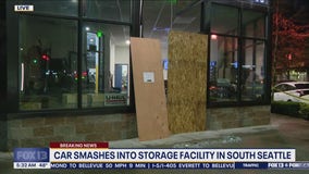 Car smashes into storage facility in South Seattle