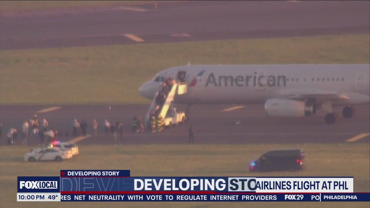 American Airlines flight met by law enforcement at PHL