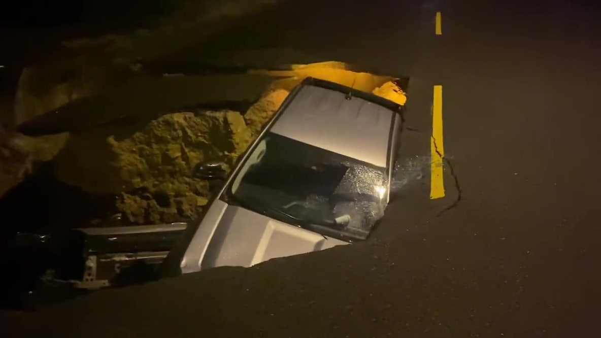Chatsworth sinkhole swallows 2 cars, 2 people rescued