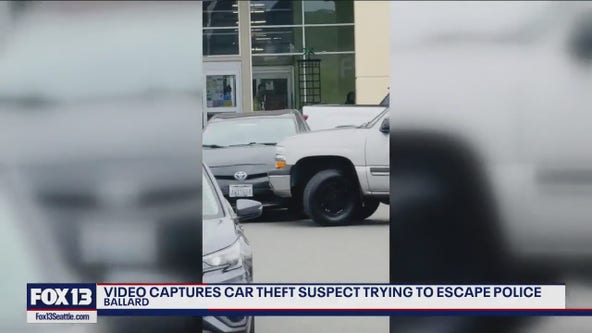 Shocked Fred Meyer shoppers watch as SUV driver rams Prius out of the way to escape Seattle Police