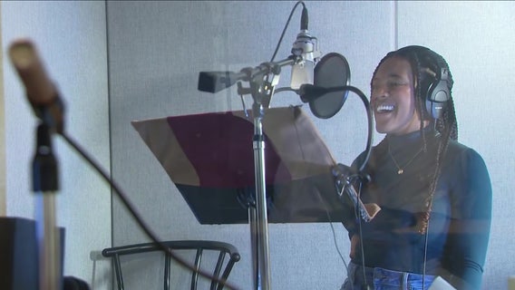 Queen Noveen paving the way behind the mic