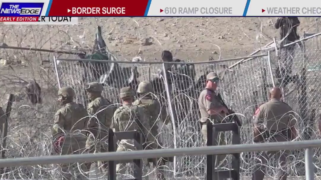 Border surge heats up, migrants rushed guardsmen