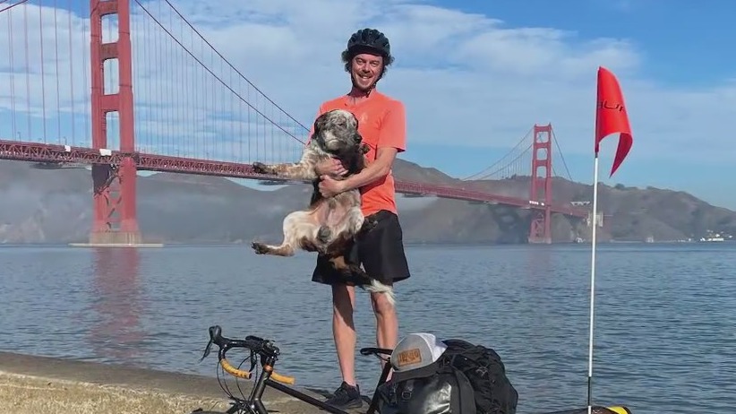 Wildland firefighter, his dog take 3,700-mile bike ride to overcome mental health struggles
