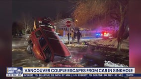 Vancouver couple escapes from car in sinkhole
