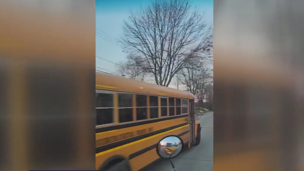 Greenfield school bus passed with stop sign out
