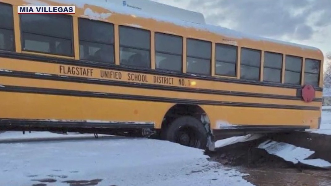 Flagstaff school bus gets stuck in sinkhole