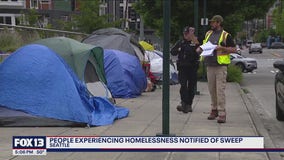 Unhoused encampment along busy Seattle thoroughfare faces imminent sweep