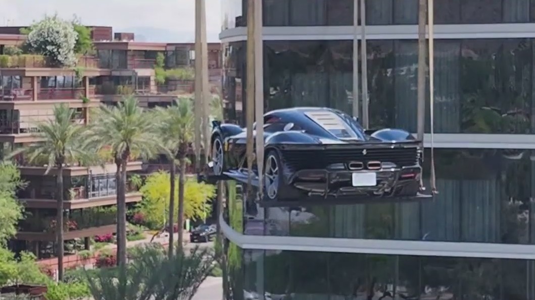 Ferrari lifted onto roof of hotel in Scottsdale