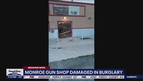 Monroe gun shop damaged in burglary