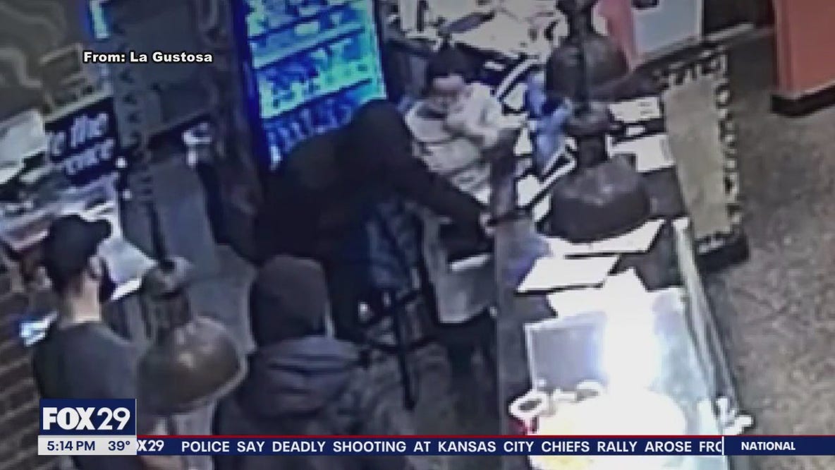 Video shows suspect robbing pizza shop in Spring Garden at gunpoint