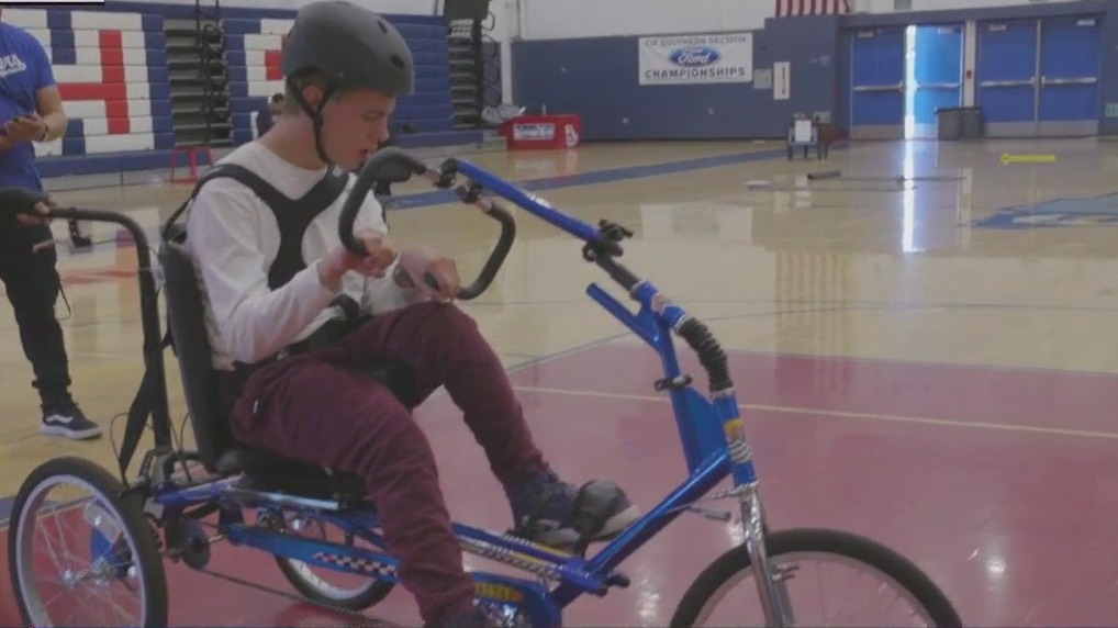 High school students come together to help classmate win adaptive bike