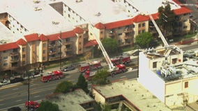 Crews battling apartment fire in Sun Valley