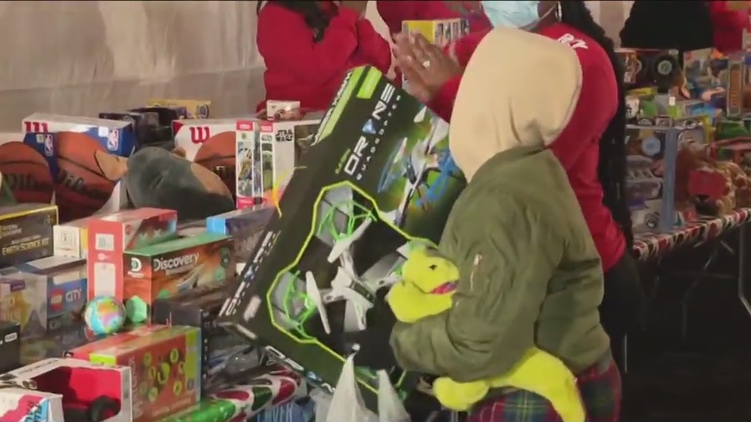 Toy giveaway in Roseland leaves kids of all ages happy for the holidays