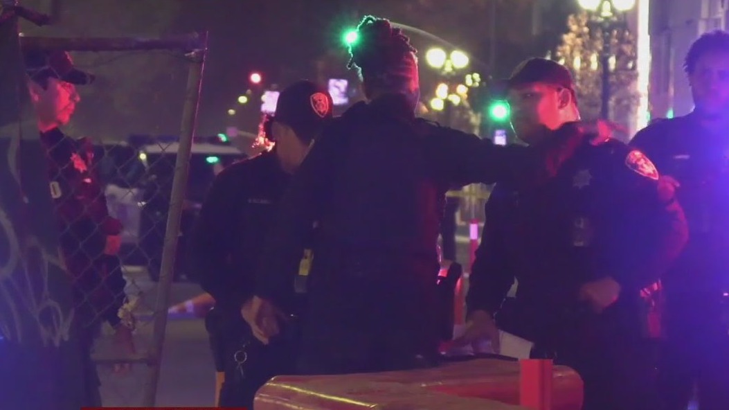 Car with bullet holes crashes into Oakland site near federal building