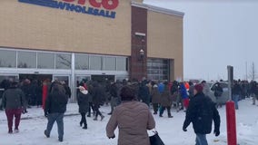 Crowd lines up outside Costco in Eden Prairie ahead of storm