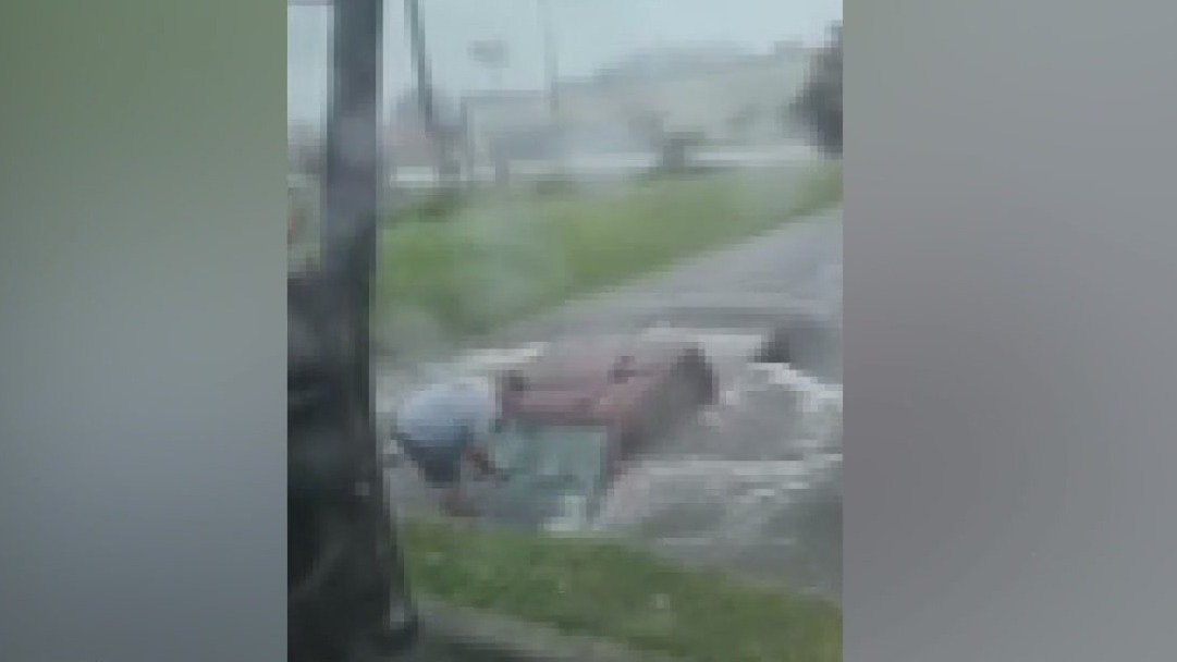 Houston weather: Couple performs dramatic rescue saving man inside rapidly flooding truck
