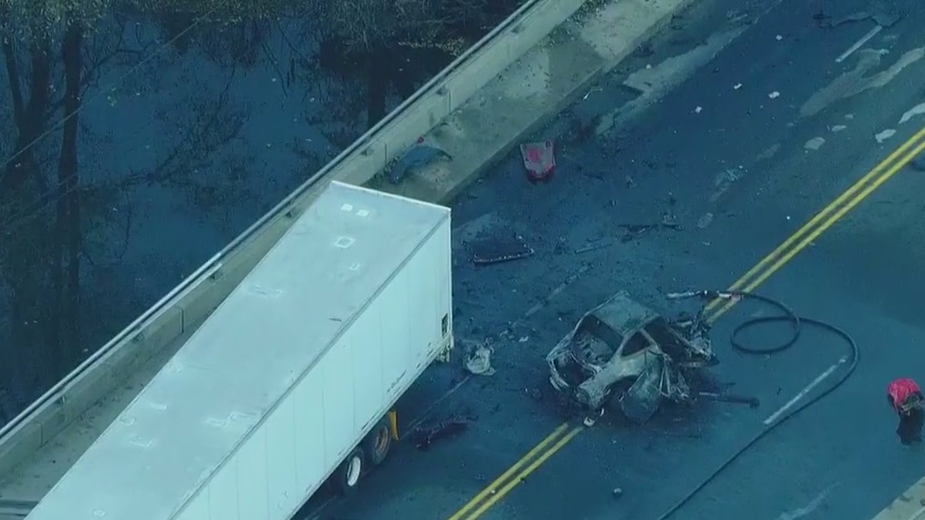 Crews work to clean up head-on collision between car and semi in Dolton