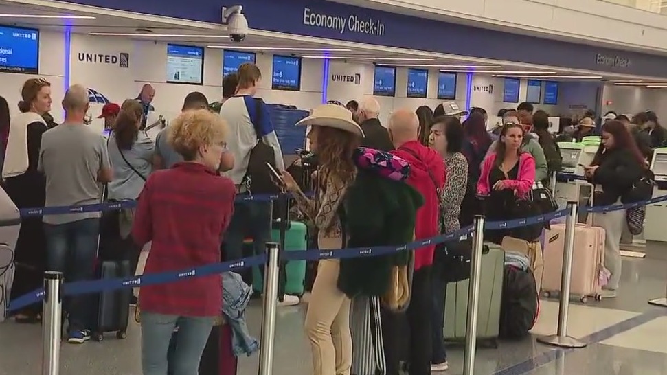 Travel rush underway as flight disruptions continue