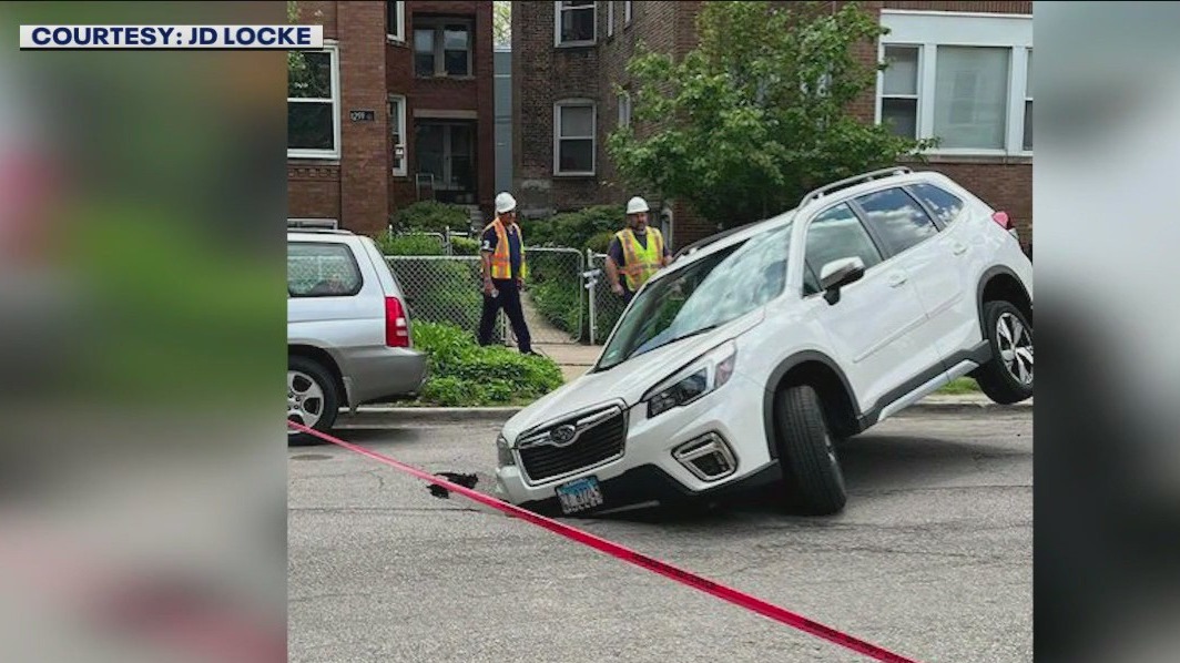 Photos show vehicle stuck in sinkhole in Chicago's Uptown neighborhood